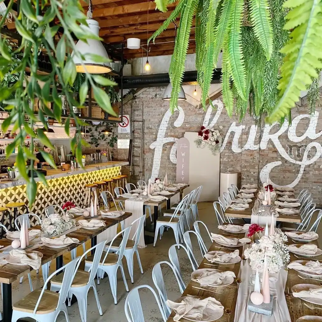 Cozy restaurant interior with warm lighting and rustic décor